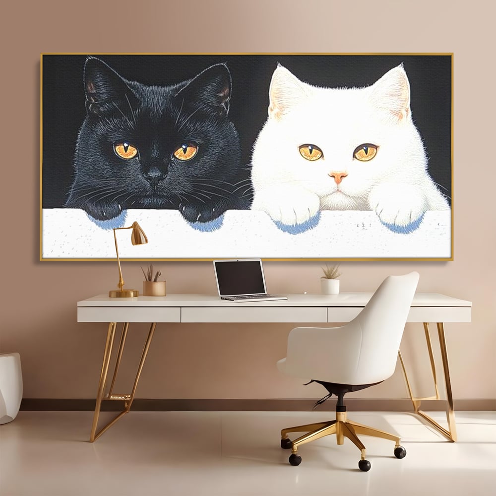 Tablou canvas cu tablou canvas cu pisici alb si negru, in rama de aluminiu auriu, pe perete intr-un birou